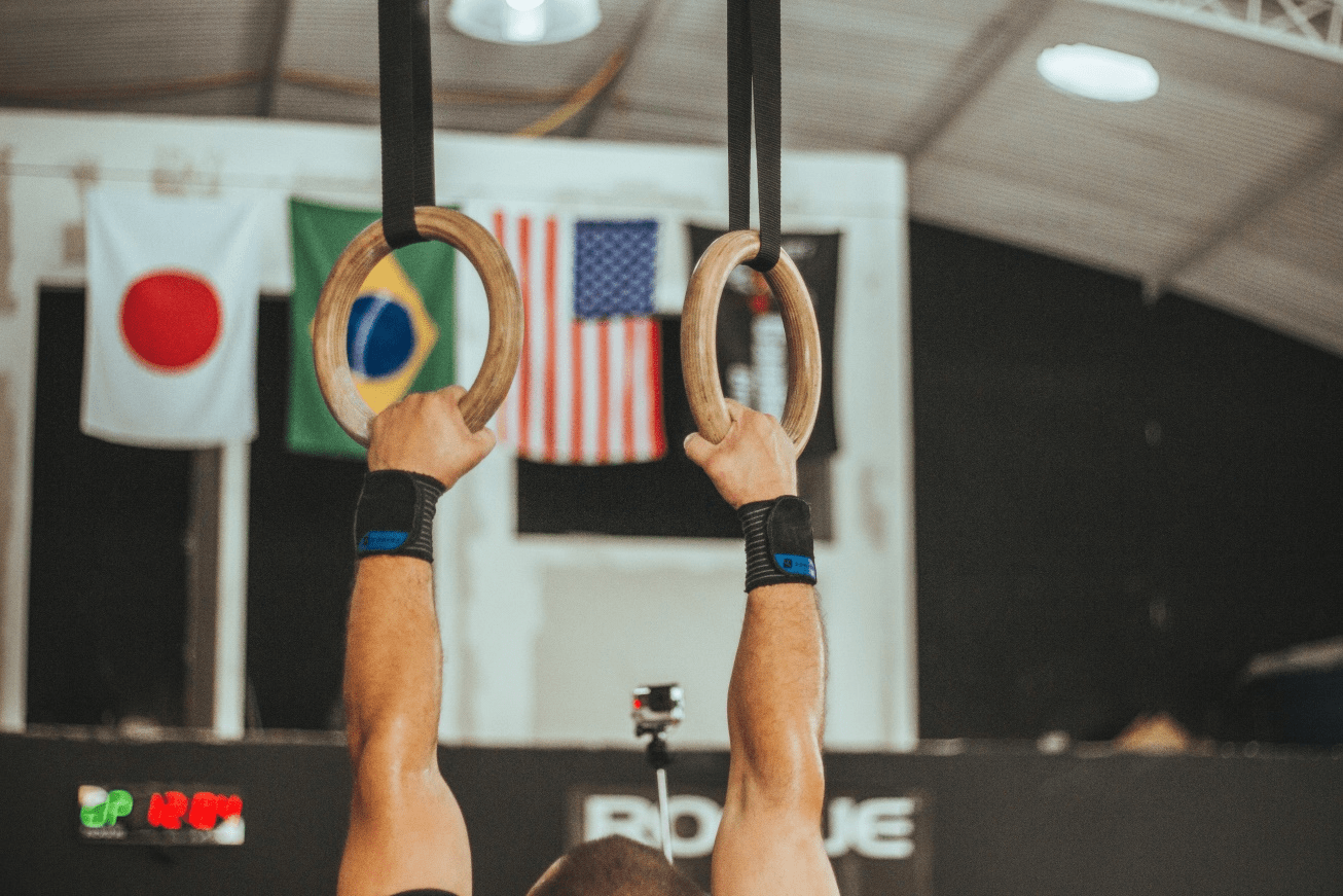 Gymnast practicing on gymnastic rings