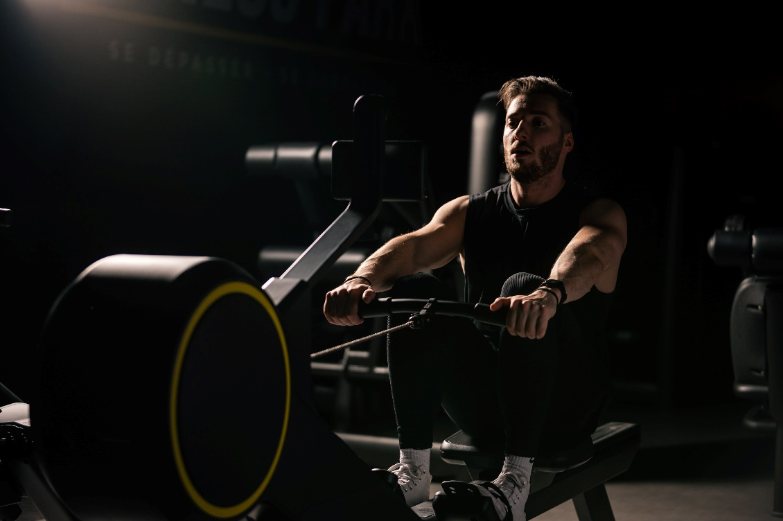 A man doing indoor rowing