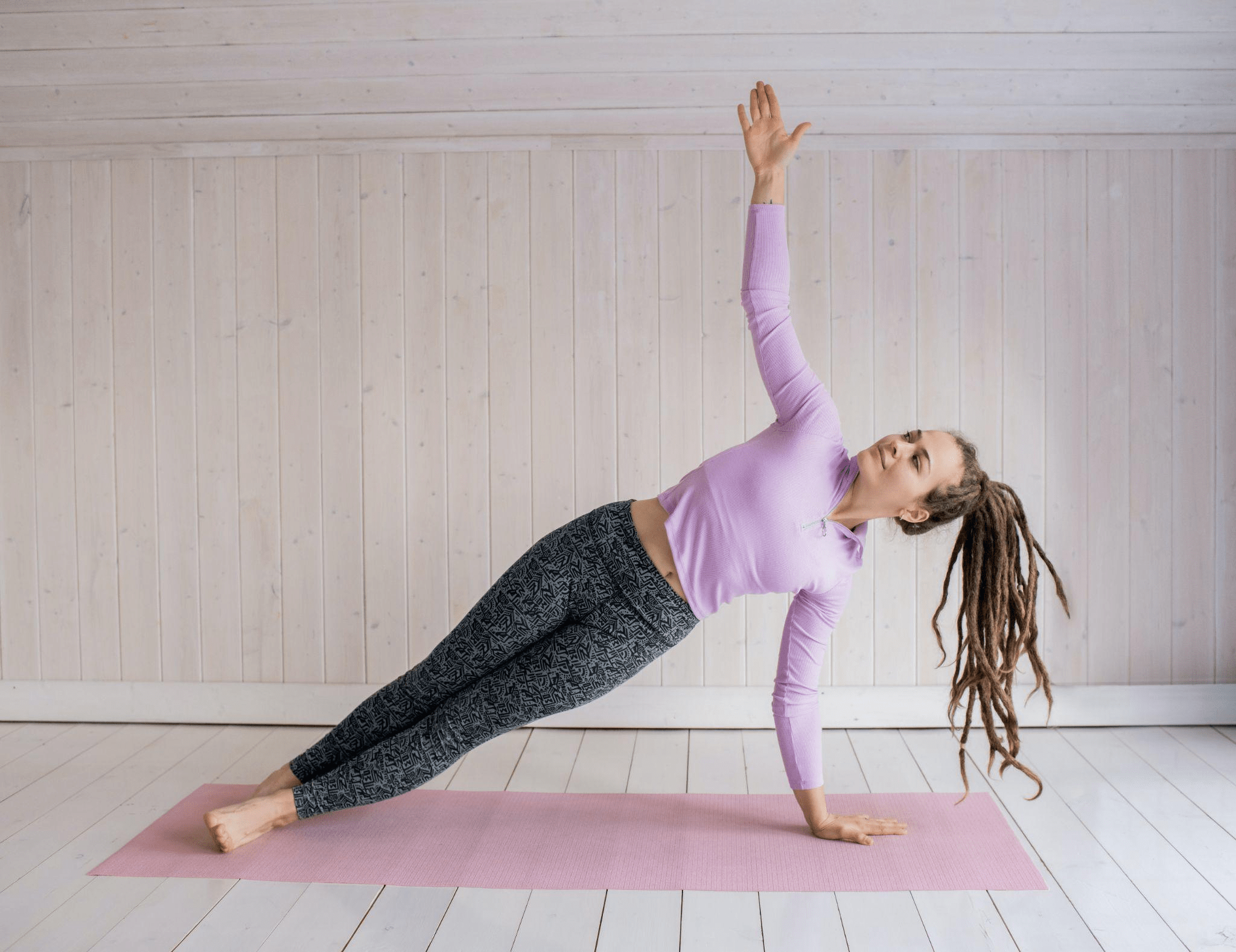 A woman doing pilates and yoga together